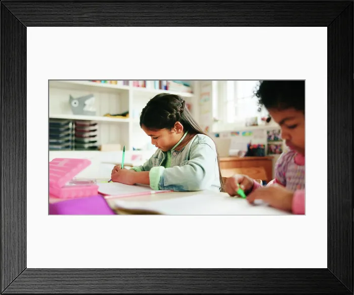 Framed Print : Education, students and child writing in classroom for learning Framed Print : Education, students and child writing in classroom for learning