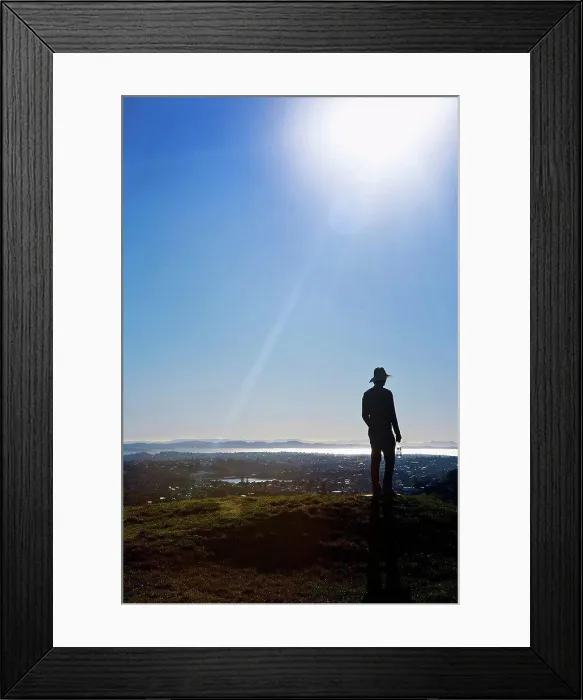 Framed Print : Silhouette Of A Man In A Hat Standing On Mt. Eden With A View Of Auckland; New Zealand Framed Print : Silhouette Of A Man In A Hat Standing On Mt. Eden With A View Of Auckland; New Zealand