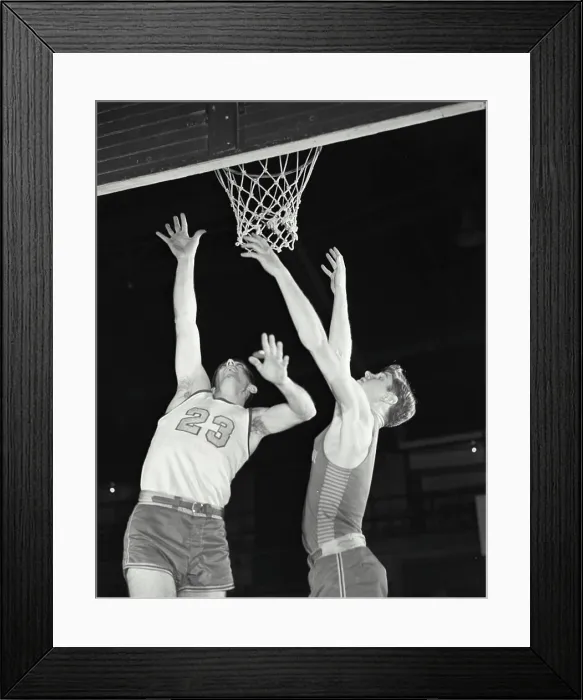 Framed Print : Vintage Photograph. Two men playing basketball jumping up for ball near basket Framed Print : Vintage Photograph. Two men playing basketball jumping up for ball near basket