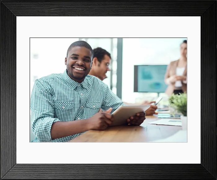 Framed Print : Creative, black businessman and portrait in meeting with tablet by website design company for brand identity