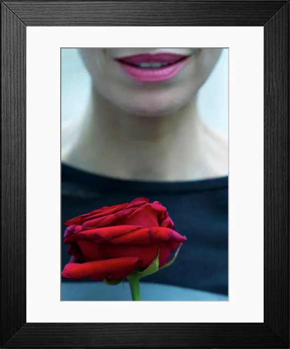 Framed Print : Woman holding single rose, cropped Framed Print : Woman holding single rose, cropped