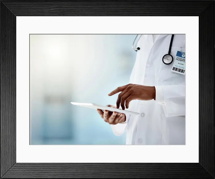 Framed Print : Hospital, health and doctor with tablet and stethoscope