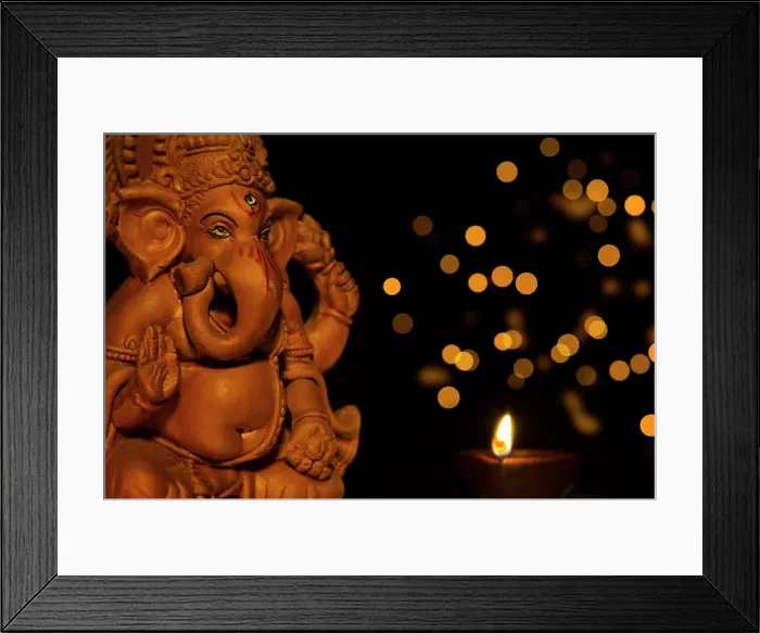 Framed Print : idol of lord ganesha with sweets Framed Print : idol of lord ganesha with sweets