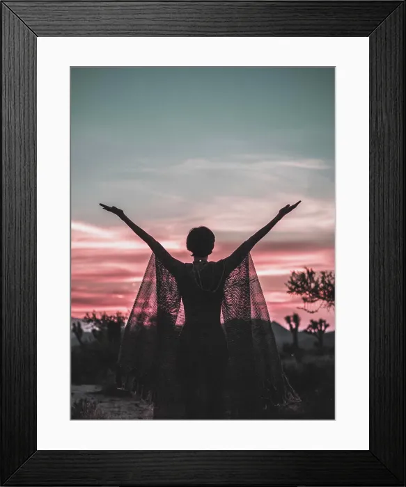 Framed Print : USA, California, Joshua Tree National Park. Silhouetted woman raising arms in front of desert sunset Framed Print : USA, California, Joshua Tree National Park. Silhouetted woman raising arms in front of desert sunset