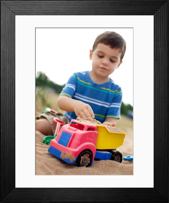 Framed Print : Boy playing with toy truck on the beach, Glen Arbor, Leelanau County, Michigan, USA Framed Print : Boy playing with toy truck on the beach, Glen Arbor, Leelanau County, Michigan, USA