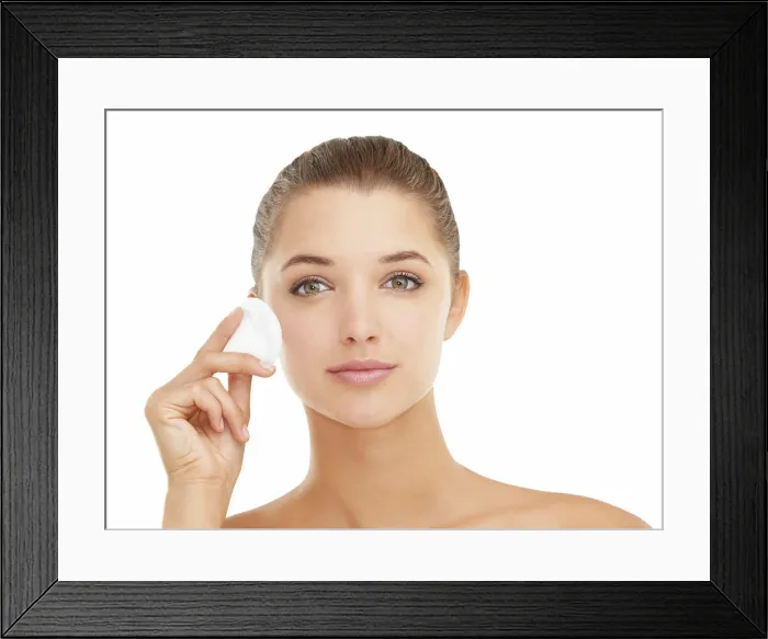 Framed Print : Face, skincare or cotton pad for woman in studio for wellness Framed Print : Face, skincare or cotton pad for woman in studio for wellness