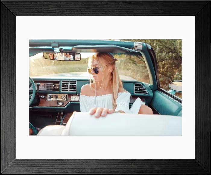 Framed Print : Girl posing in a convertible Girl posing in a convertible on the camera Framed Print : Girl posing in a convertible Girl posing in a convertible on the camera
