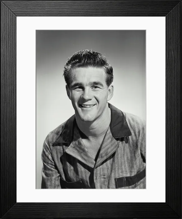 Framed Print : Vintage photograph. man in work clothes smiling at camera Framed Print : Vintage photograph. man in work clothes smiling at camera