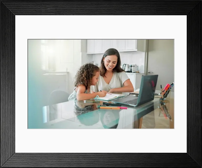 Framed Print : Mother helping her girl with writing her homework of a happy family house in her creative kids notebook