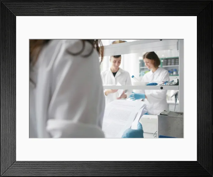 Framed Print : People co-working in lab