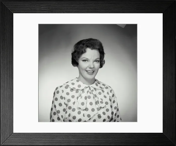 Framed Print : Vintage Photograph. Brunette woman wearing polka dot blouse looking at camera smiling Framed Print : Vintage Photograph. Brunette woman wearing polka dot blouse looking at camera smiling