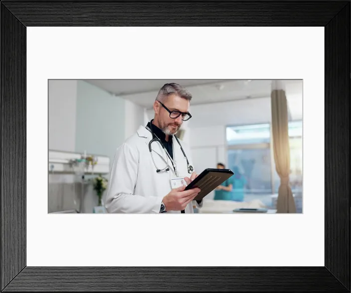 Framed Print : Medical, doctor and typing on tablet at clinic for Telehealth consultation Framed Print : Medical, doctor and typing on tablet at clinic for Telehealth consultation