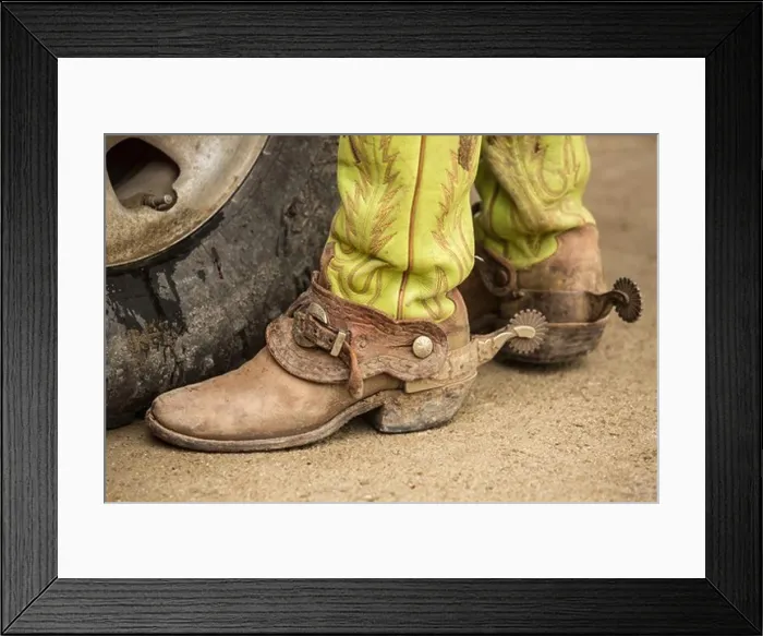 Framed Print : USA, Texas, Cowboy boots with spurs next to pickup truck tire Framed Print : USA, Texas, Cowboy boots with spurs next to pickup truck tire