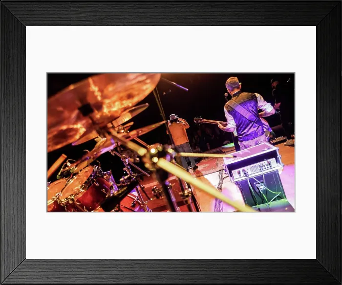 Framed Print : Milan, italy 2 april 2025: musicians playing their instruments on a stage during a live rock concert Framed Print : Milan, italy 2 april 2025: musicians playing their instruments on a stage during a live rock concert