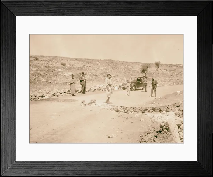 Framed Print : Hebron attack. Great boulders on the Hebron Highway placed by Arab gangs as a means toward wrecking police Framed Print : Hebron attack. Great boulders on the Hebron Highway placed by Arab gangs as a means toward wrecking police