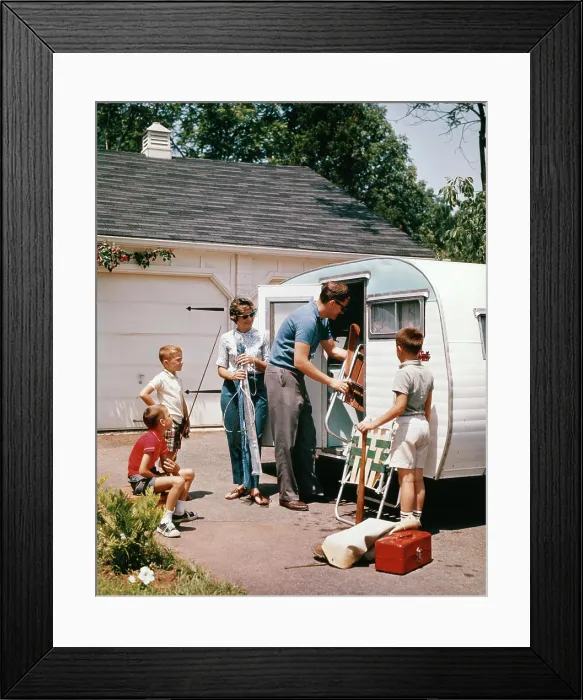 Framed Print : 1960S Family Loading Camping Trailer For Vacation Framed Print : 1960S Family Loading Camping Trailer For Vacation