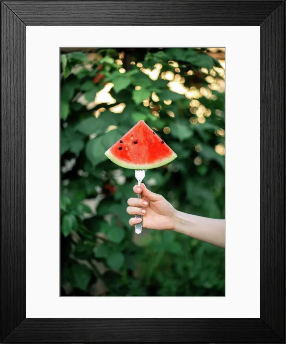 Framed Print : a woman with a watermelon on the garden Framed Print : a woman with a watermelon on the garden