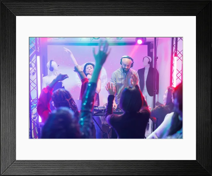 Framed Print : Crowd dancing at band concert in club Framed Print : Crowd dancing at band concert in club