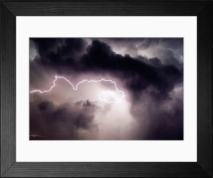 Framed Print : A Twisting Cloud To Cloud Lightning Bolt From the Air Framed Print : A Twisting Cloud To Cloud Lightning Bolt From the Air