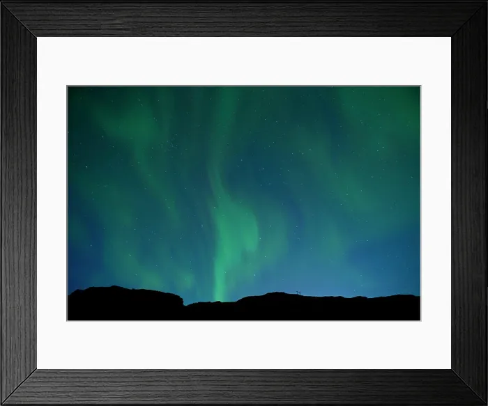 Framed Print : Aurora Borealis or Northern lights dancing in the sky above Iceland Framed Print : Aurora Borealis or Northern lights dancing in the sky above Iceland