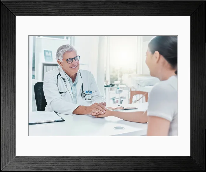 Framed Print : Happy doctor, patient and holding hands for comfort in consultation for healthcare or good results Framed Print : Happy doctor, patient and holding hands for comfort in consultation for healthcare or good results