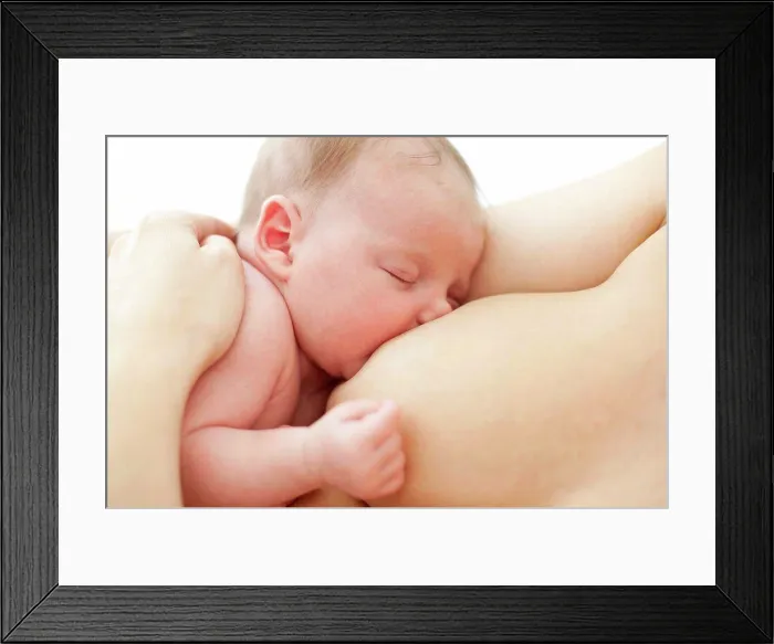 Framed Print : Newborn baby breastfeeding Framed Print : Newborn baby breastfeeding