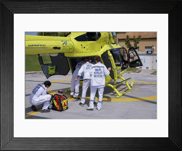 Framed Print : The SMUR helicopter transports patients 7 days a week, 24 hours a day. Return from intervention Framed Print : The SMUR helicopter transports patients 7 days a week, 24 hours a day. Return from intervention