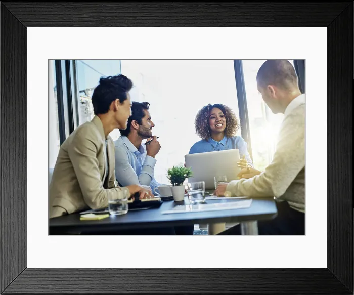 Framed Print : Business people, laptop and collaboration with team in meeting for discussion or development at office Framed Print : Business people, laptop and collaboration with team in meeting for discussion or development at office