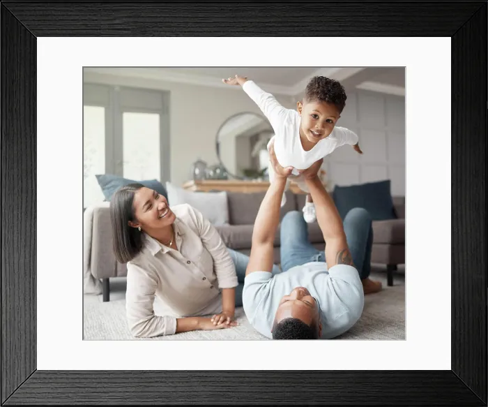 Framed Print : Happy family, kids and flying games in home on living room floor for fun Framed Print : Happy family, kids and flying games in home on living room floor for fun