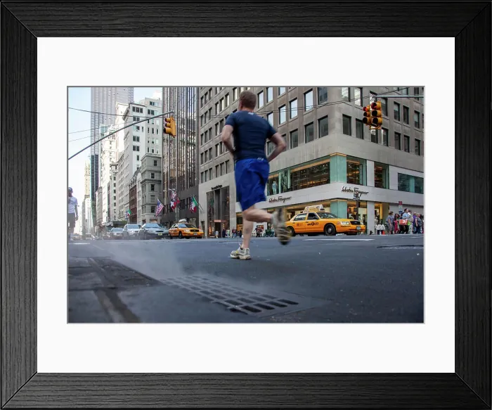 Framed Print : Man jogging on busy New York street from behind Framed Print : Man jogging on busy New York street from behind