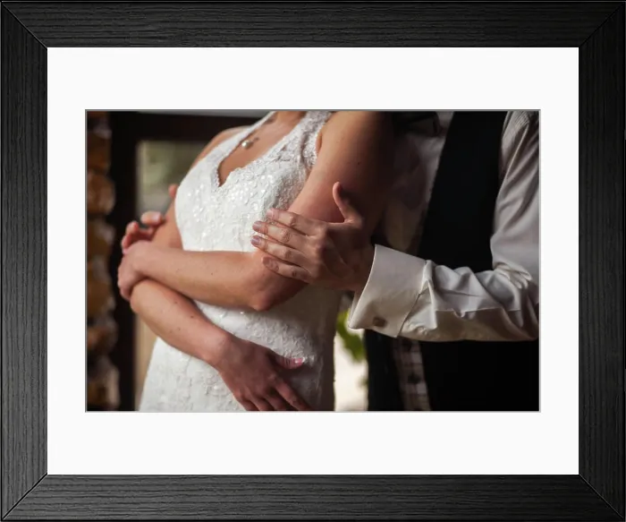 Framed Print : groom gently embraces the bride The hand of the groom gently embraces the bride Framed Print : groom gently embraces the bride The hand of the groom gently embraces the bride