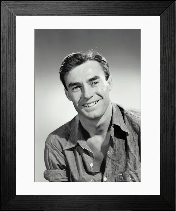Framed Print : Vintage photograph. Portrait of man in button shirt smiling