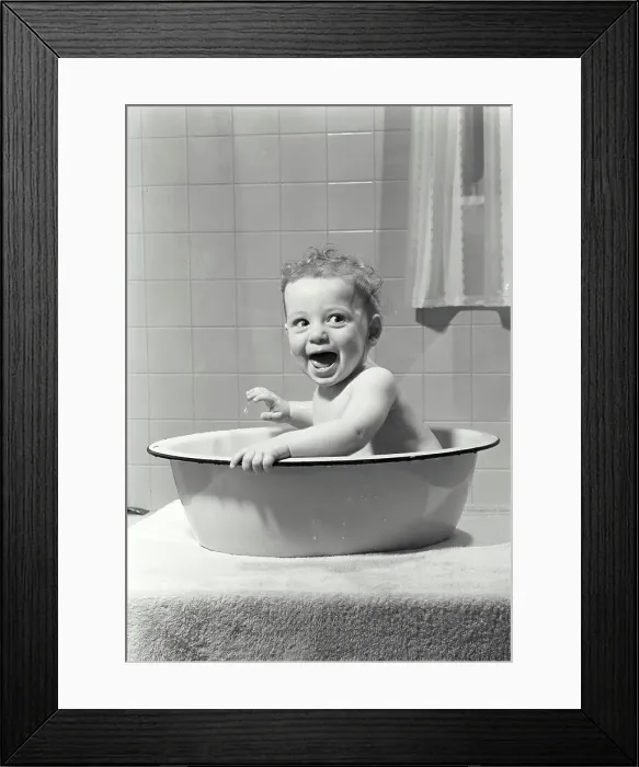 Framed Print : Baby sitting in a washtub Framed Print : Baby sitting in a washtub