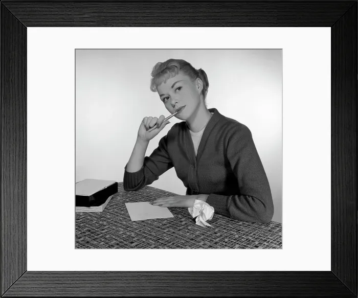 Framed Print : Mid adult woman writing letter Framed Print : Mid adult woman writing letter