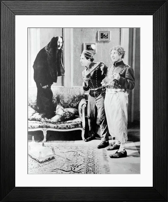 Framed Print : A Day At The Races'. Groucho in disguise eludes Chico with tray and Harpo with seltzer Framed Print : A Day At The Races'. Groucho in disguise eludes Chico with tray and Harpo with seltzer