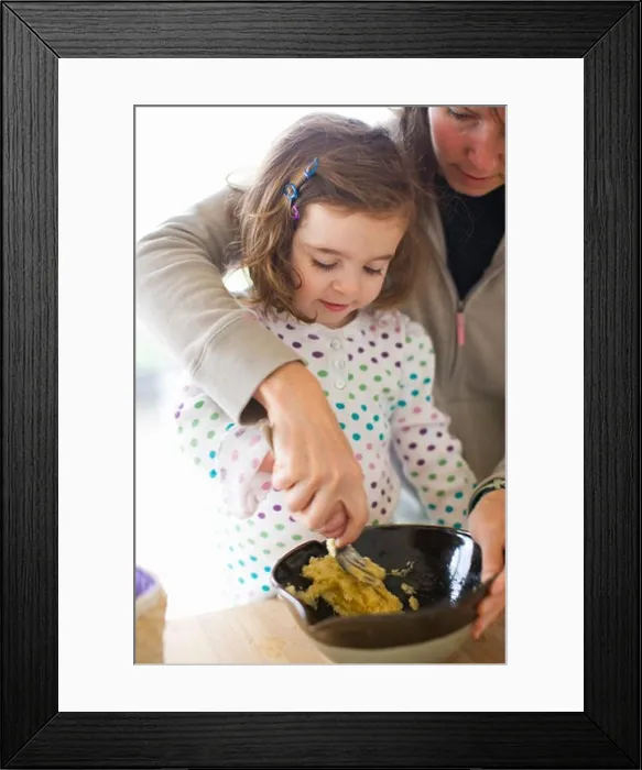 Framed Print : Mother and Daughter Preparing Food in Kitchen Framed Print : Mother and Daughter Preparing Food in Kitchen
