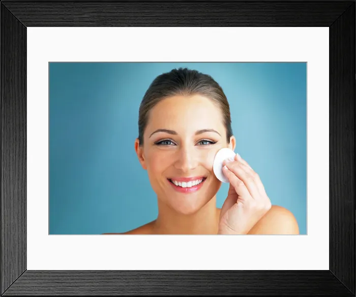 Framed Print : Dermatology, portrait and happy woman with cotton pad on face Framed Print : Dermatology, portrait and happy woman with cotton pad on face