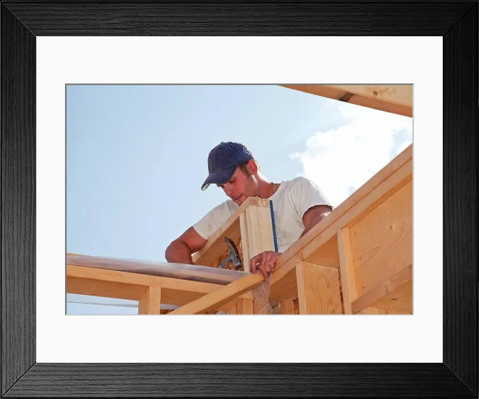 Framed Print : tradesman working on framing for new home construction, st. albert alberta canada Framed Print : tradesman working on framing for new home construction, st. albert alberta canada