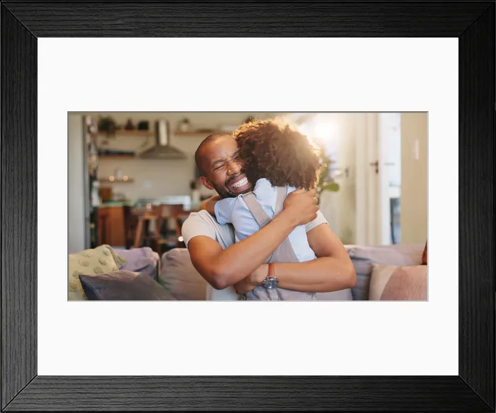 Framed Print : Happy dad, hug and son with love on sofa for embrace Framed Print : Happy dad, hug and son with love on sofa for embrace