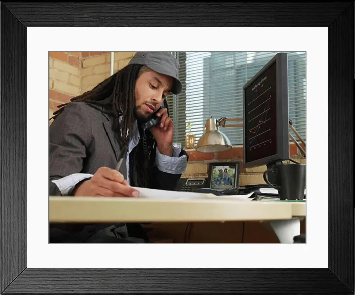 Framed Print : Businessman Working at Desk Framed Print : Businessman Working at Desk