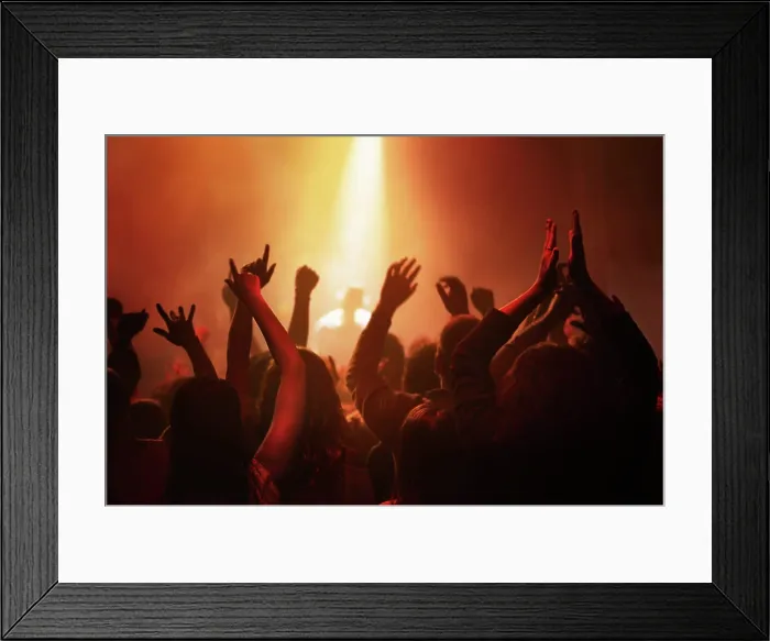 Framed Print : Hands of people in crowd dancing at concert or music festival Framed Print : Hands of people in crowd dancing at concert or music festival