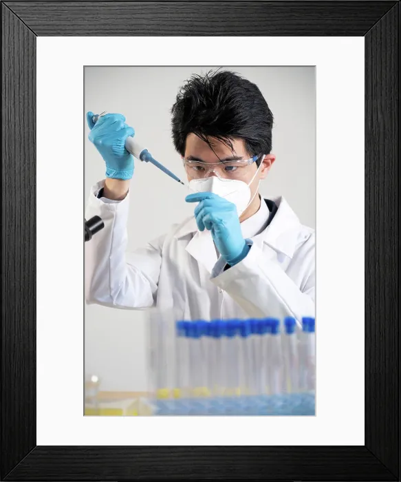 Framed Print : Laboratory assistant conducting experiments for laboratory research Framed Print : Laboratory assistant conducting experiments for laboratory research