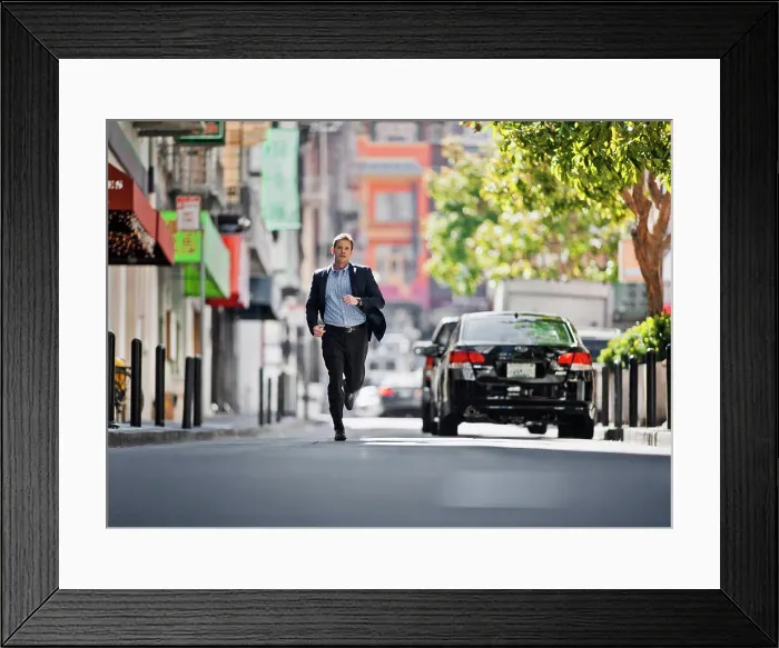 Framed Print : Businessman running late for work Framed Print : Businessman running late for work