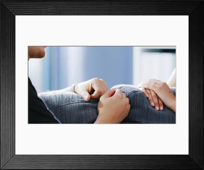 Framed Print : Hands, talking and relax with couple on sofa for connection Framed Print : Hands, talking and relax with couple on sofa for connection