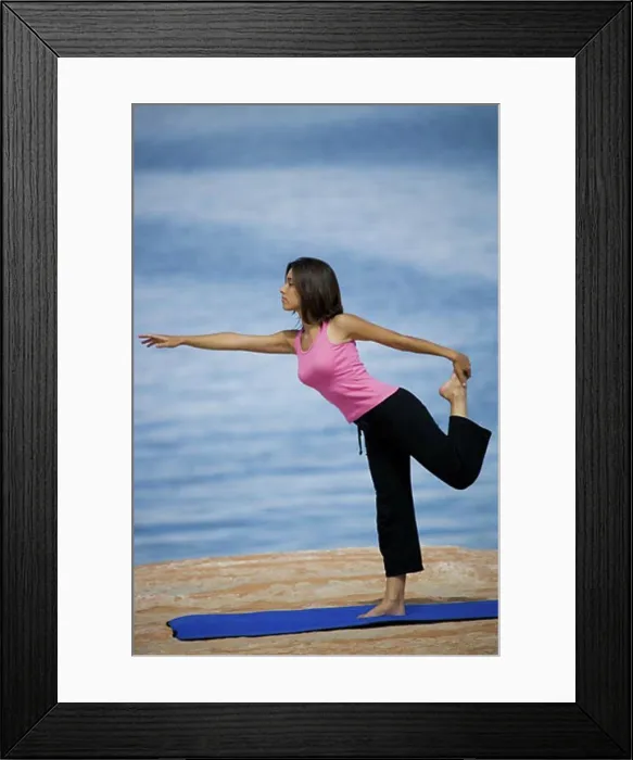 Framed Print : Profile of a young woman exercising Framed Print : Profile of a young woman exercising
