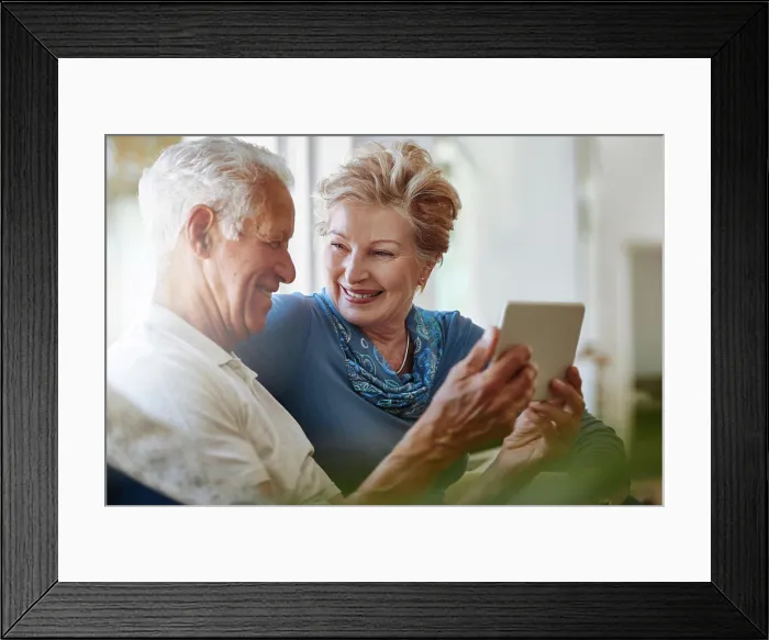 Framed Print : Senior couple, online and tablet for streaming Framed Print : Senior couple, online and tablet for streaming