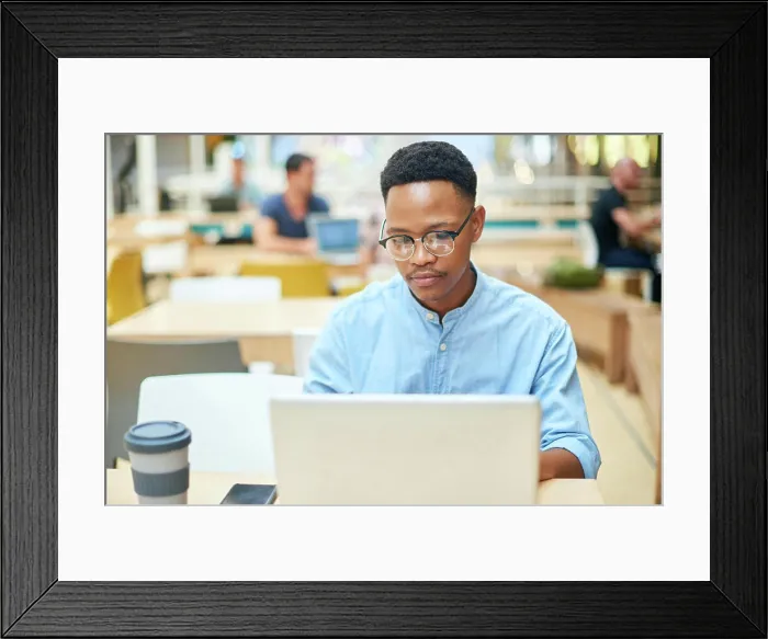 Framed Print : Working, black man and laptop in office for research Framed Print : Working, black man and laptop in office for research