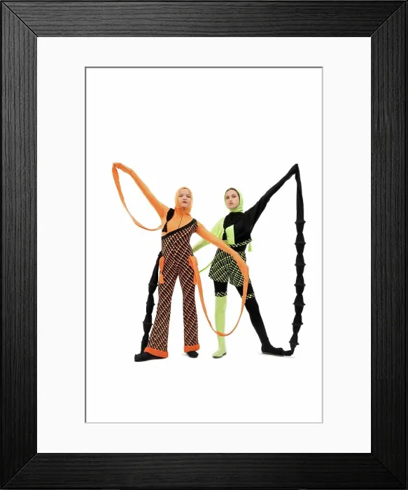 Framed Print : Pretty teens in fantastic clothes isolated shot Pretty teens in fantastic aliens clothes full-length isolated shot