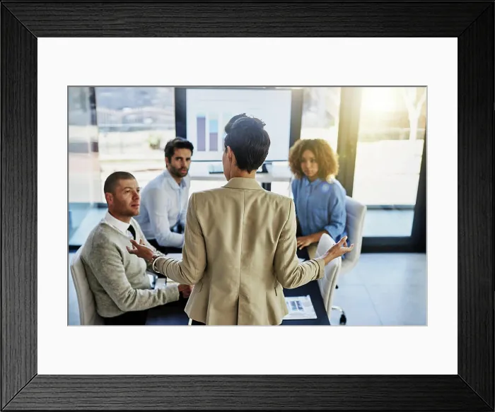 Framed Print : Business person, coach and screen with team in meeting Framed Print : Business person, coach and screen with team in meeting