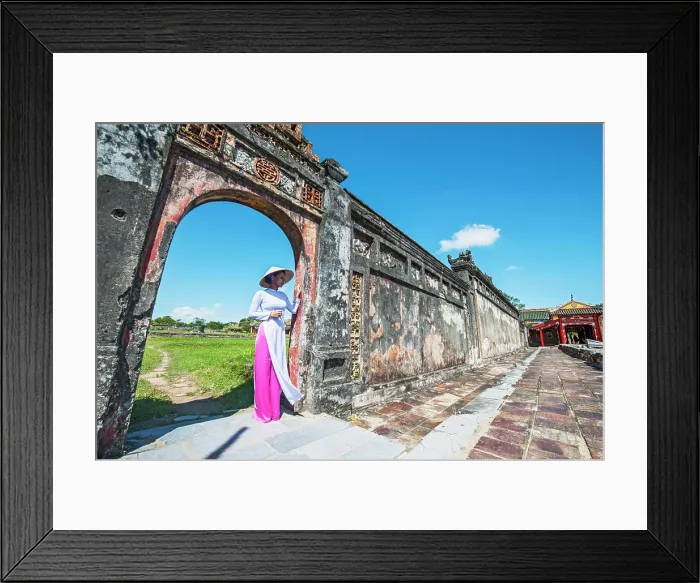 Framed Print : beautiful woman exploring the imperial palace in Hue / Vietnam Framed Print : beautiful woman exploring the imperial palace in Hue / Vietnam